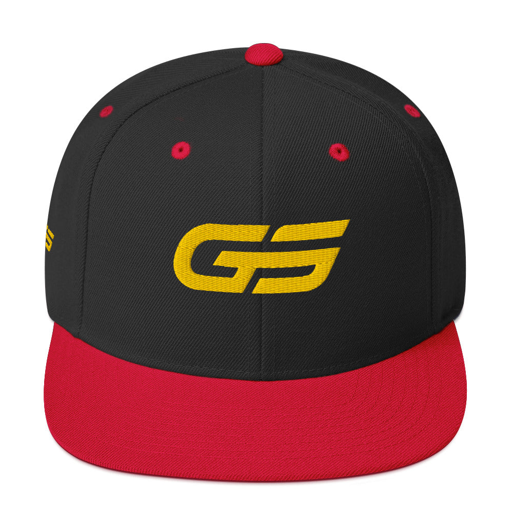Casquette snapback noire/rouge avec logo GS jaune et boutons rouges décoratifs