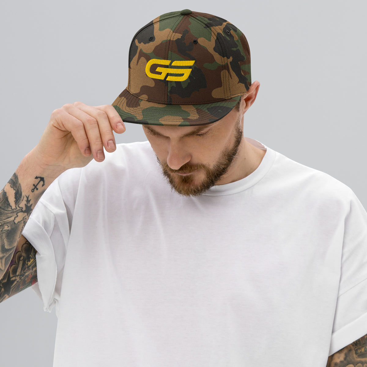 Casquette snapback camouflage vert avec logo GS jaune sur le devant