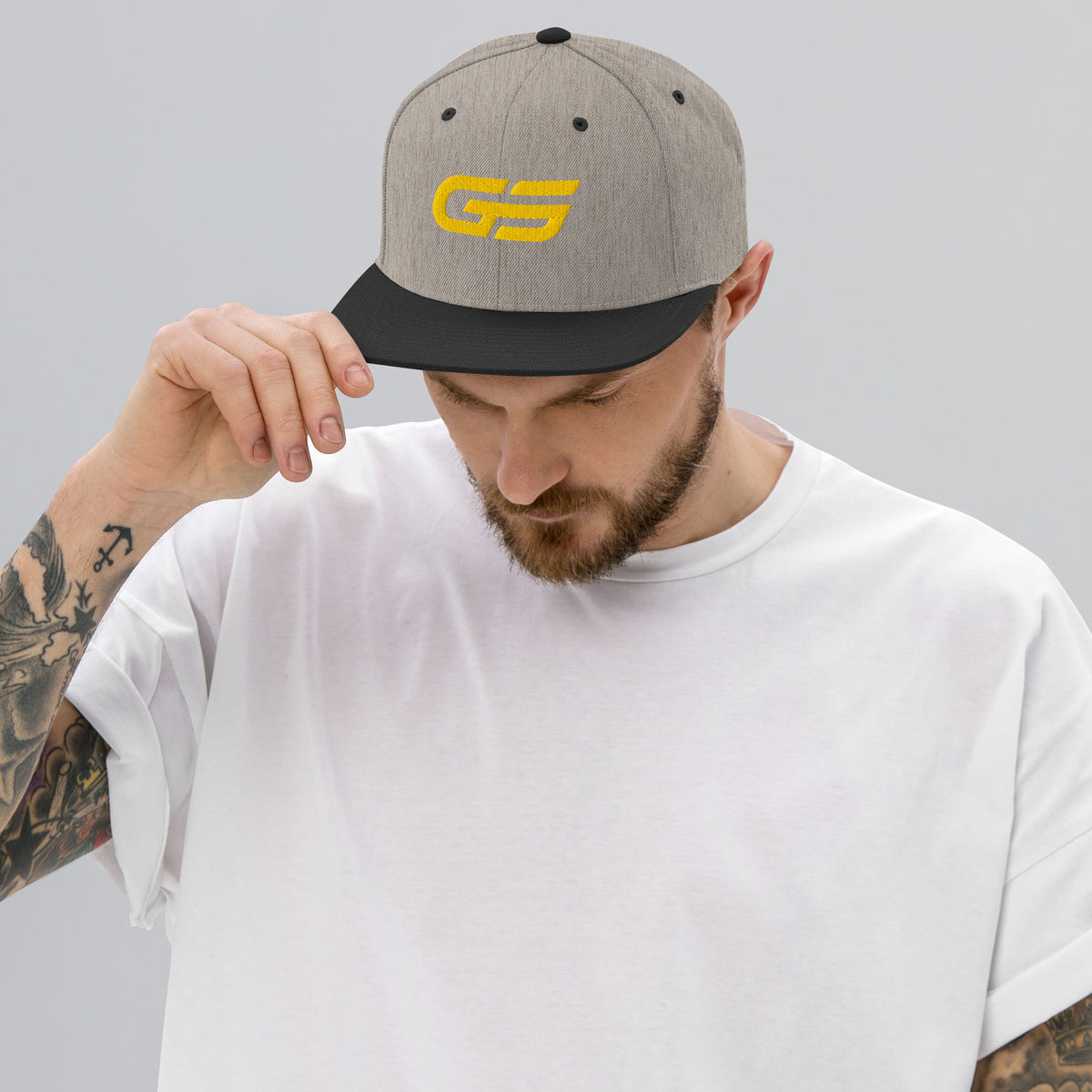 Casquette snapback gris chiné/noir avec logo GS jaune sur le devant