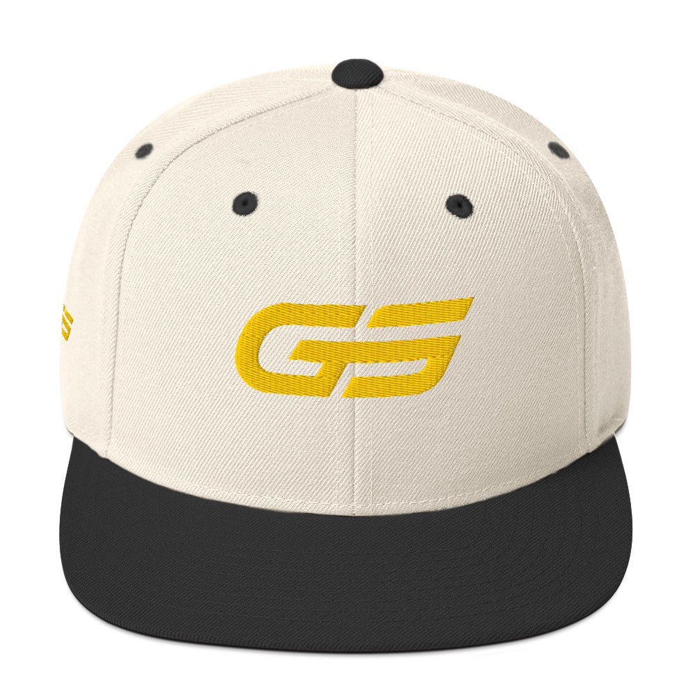 Casquette snapback beige naturel, logo GS jaune, visière noire, œillets noirs